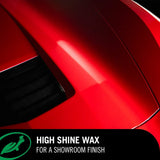 Close-up of a glossy red car body featuring a high shine finish from Turtle Wax ceramic wax.