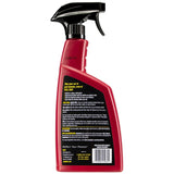 Red car wax spray bottle with black trigger, labeled for quick waxing in full sun, safe on glossy paint and plastic trim.