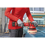 Person using a cordless random orbital polisher on a car hood
