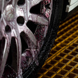 Labocosmetica SIDERO iron remover turning purple on a dirty car wheel rim