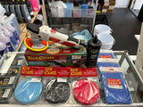 The Detailer’s Emporium car polishing kit with orbital polisher and colored foam pads