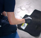 Applying Fabric Coat spray to car floor mat for interior detailing protection